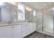 Elegant bathroom with double vanity, marble shower, and modern fixtures at 6044 Scalybark Road, Durham, NC 27712