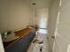 Bathroom with dual sinks, modern fixtures, and a bathtub at 6044 Scalybark Road, Durham, NC 27712