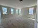 Bright bedroom with multiple windows providing natural light at 6044 Scalybark Road, Durham, NC 27712
