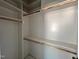 Spacious walk-in closet with rod and shelf storage solutions at 6044 Scalybark Road, Durham, NC 27712