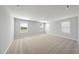 Bright bedroom featuring plush carpeting and natural light streaming through multiple windows at 77 Buckhorn Branch Park # 174, Clayton, NC 27520