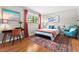 Bright bedroom with stylish decor, a comfortable bed, and a functional workspace at 807 W Trinity Ave # 220, Durham, NC 27701