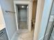 Bathroom featuring tile floors, a toilet, and a doorway to a large walk-in closet at 1060 Fairhaven Dr # 96, Mebane, NC 27302