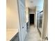 Spacious bathroom with long tile floor and shower to the right at 1060 Fairhaven Dr # 96, Mebane, NC 27302