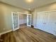 Bright home office featuring French doors, a closet, and hardwood floors at 1060 Fairhaven Dr # 96, Mebane, NC 27302