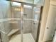Modern bathroom shower featuring glass enclosure, mosaic tile accents, built in seat and tiled walls at 1060 Fairhaven Dr # 96, Mebane, NC 27302