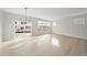 Spacious dining area with hardwood floors and large windows at 20 Nettle Ln # 239, Clayton, NC 27520
