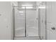 Shower with sliding glass door and window at 585 Husketh Rd, Youngsville, NC 27596