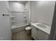 Clean bathroom featuring a tub/shower combination and a vanity with a white countertop at 6040 Scalybark Road, Durham, NC 27712