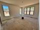 A light-filled bedroom offers a blank canvas for the new homeowner at 6040 Scalybark Road, Durham, NC 27712