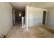 Unfinished living room with newly installed walls ready for your finishing touches and decor at 6040 Scalybark Road, Durham, NC 27712