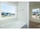 Bathroom with soaking tub and large window for natural light at 286 Yellowwood Ave, Spring Hope, NC 27882