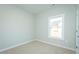 Bedroom featuring neutral carpet and a bright window at 286 Yellowwood Ave, Spring Hope, NC 27882