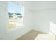 Walk-in closet featuring a sunny window and wire shelving at 286 Yellowwood Ave, Spring Hope, NC 27882
