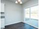 Bright dining area with sliding glass doors leading to the outdoor patio at 286 Yellowwood Ave, Spring Hope, NC 27882