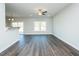 Open living room with modern ceiling fan and plenty of natural light at 286 Yellowwood Ave, Spring Hope, NC 27882