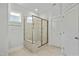 Modern bathroom with a glass shower and tile floor at 441 Edison Rail Ln, Knightdale, NC 27545