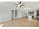 Open concept living room with hardwood floors and view of kitchen at 441 Edison Rail Ln, Knightdale, NC 27545
