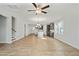 Open concept living room with hardwood floors and view of stairs at 441 Edison Rail Ln, Knightdale, NC 27545