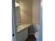 Cozy half bathroom featuring modern fixtures, vanity, and toilet at 4429 Log Cabin Dr, Raleigh, NC 27616