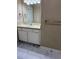 Bathroom featuring modern vanity, decorative lighting, and updated fixtures at 4429 Log Cabin Dr, Raleigh, NC 27616