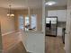 Stylish kitchen featuring granite countertops, stainless steel appliances, and modern lighting at 4429 Log Cabin Dr, Raleigh, NC 27616