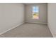 Spacious bedroom with a window and carpeted floor at 145 Brookhaven Dr, Spring Hope, NC 27882