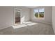 Bright bedroom boasts a large window and plush carpeting, creating a comfortable retreat at 145 Brookhaven Dr, Spring Hope, NC 27882