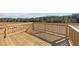 Wooden deck with railing overlooking a wooded area at 145 Brookhaven Dr, Spring Hope, NC 27882