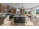 Well-equipped kitchen featuring a center island with breakfast bar and stainless steel appliances at 145 Brookhaven Dr, Spring Hope, NC 27882