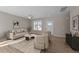 Inviting living room features light-colored walls, wood floors, and a neutral color palette at 145 Brookhaven Dr, Spring Hope, NC 27882