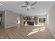 Spacious living room with hardwood floors and ceiling fan at 145 Brookhaven Dr, Spring Hope, NC 27882