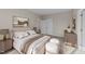 Cozy main bedroom featuring a king-size bed, neutral decor, and ample closet space at 145 Brookhaven Dr, Spring Hope, NC 27882