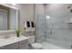 Modern bathroom with a frameless glass shower and gray tile at 149 Brandy Ml, Pittsboro, NC 27312