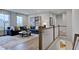 Relaxing bonus room with sectional sofa, large windows, and hardwood floors at 149 Brandy Ml, Pittsboro, NC 27312