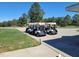 Three golf carts parked neatly in a lot at 149 Brandy Ml, Pittsboro, NC 27312