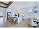 Elegant kitchen with island seating, stainless steel appliances, and hardwood floors at 149 Brandy Ml, Pittsboro, NC 27312
