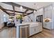 Modern kitchen featuring a farmhouse sink, stainless steel appliances, and hardwood floors at 149 Brandy Ml, Pittsboro, NC 27312