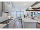 Open concept kitchen with island and breakfast nook at 149 Brandy Ml, Pittsboro, NC 27312