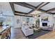 Open concept living area with hardwood floors and fireplace at 149 Brandy Ml, Pittsboro, NC 27312