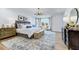 Main bedroom with large bed and plenty of natural light at 149 Brandy Ml, Pittsboro, NC 27312
