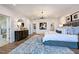 Spacious main bedroom with large bed and en-suite bathroom at 149 Brandy Ml, Pittsboro, NC 27312