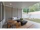 Outdoor patio with seating area and privacy screens at 2417 Mayview Rd, Raleigh, NC 27607