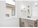Clean bathroom with single vanity and updated lighting at 2417 Mayview Rd, Raleigh, NC 27607