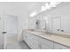 Modern bathroom boasts double vanity, and updated fixtures at 2417 Mayview Rd, Raleigh, NC 27607