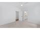 Bright bedroom with ceiling fan and access to bathroom at 2417 Mayview Rd, Raleigh, NC 27607