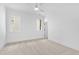 Spacious bedroom with neutral carpeting and ample natural light at 2417 Mayview Rd, Raleigh, NC 27607