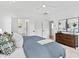 Spacious main bedroom with ensuite bathroom access and a dresser at 2417 Mayview Rd, Raleigh, NC 27607