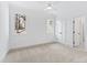 Well-lit bedroom with neutral walls and plush carpeting at 2417 Mayview Rd, Raleigh, NC 27607