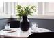 Bonus room features a small table with a modern vase at 2417 Mayview Rd, Raleigh, NC 27607